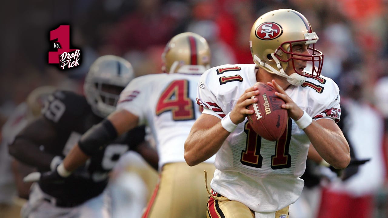 San Francisco 49ers QB Alex Smith (11) has his jersey pulled by