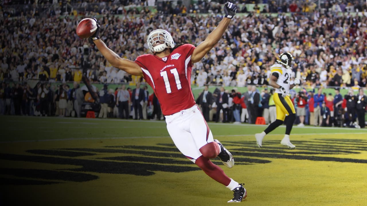 Arizona Cardinals quarterback Kurt Warner argues with a referee as Arizona  Cardinals wide receiver Larry Fitzgerald looks on in the third quarter  against the Pittsburgh Steelers at Super Bowl XLIII at Raymond