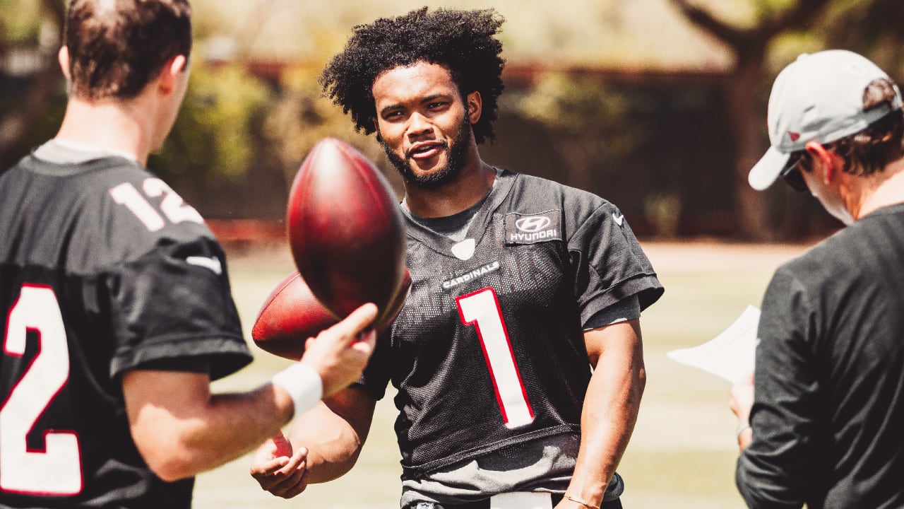 Kyler Murray signs Seahawk fan's hat, but not before writing 'Go Cards!'