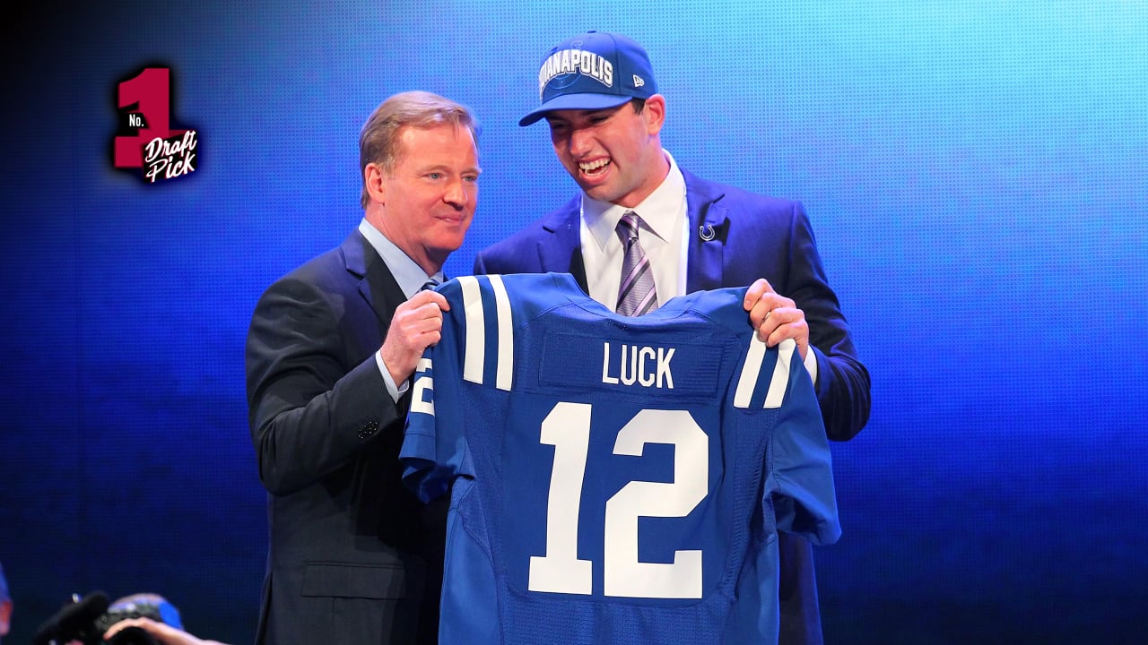 Georgia quarterback Matthew Stafford holds up his Detroit Lions jersey  after he is selected by the Lions as the number 1 overall pick at the 2009  NFL Draft at Radio City Music