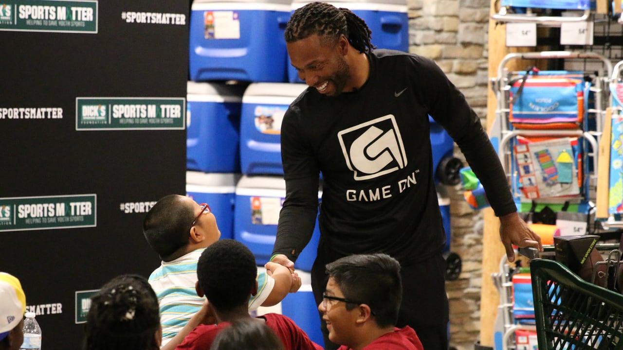 Larry Fitzgerald takes kids on shopping spree