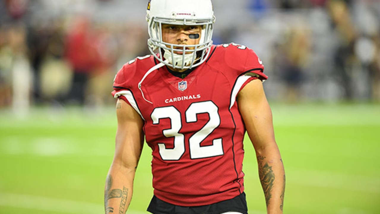 Arizona Cardinals free safety Tyrann Mathieu (32) warms up prior to an NFL  preseason football game against the San Diego Chargers, Saturday, Aug. 22,  2015, in Glendale, Ariz. (AP Photo/Rick Scuteri Stock