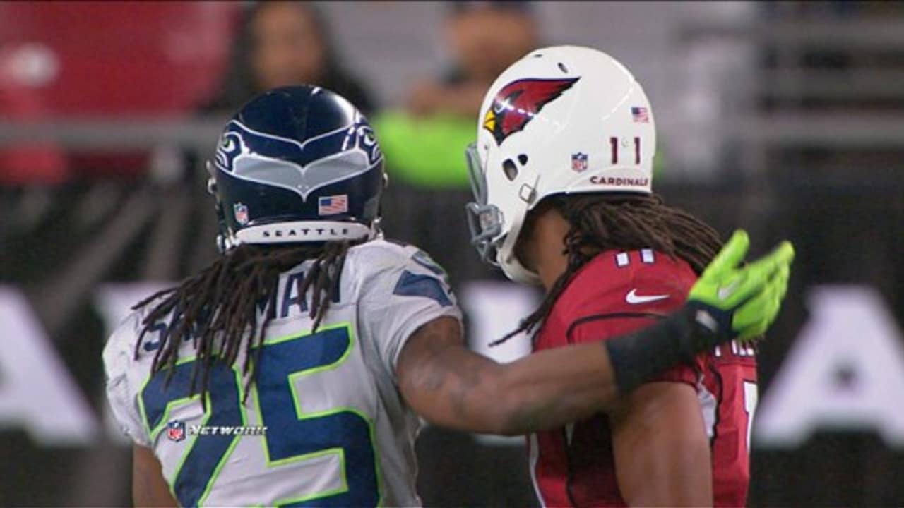 Seattle Seahawks' Richard Sherman, left, greets Arizona Cardinals' Larry  Fitzgerald after an NFL football game Sunday, Dec. 31, 2017, in Seattle.  Arizona won 26-24. (AP Photo/Elaine Thompson Stock Photo - Alamy