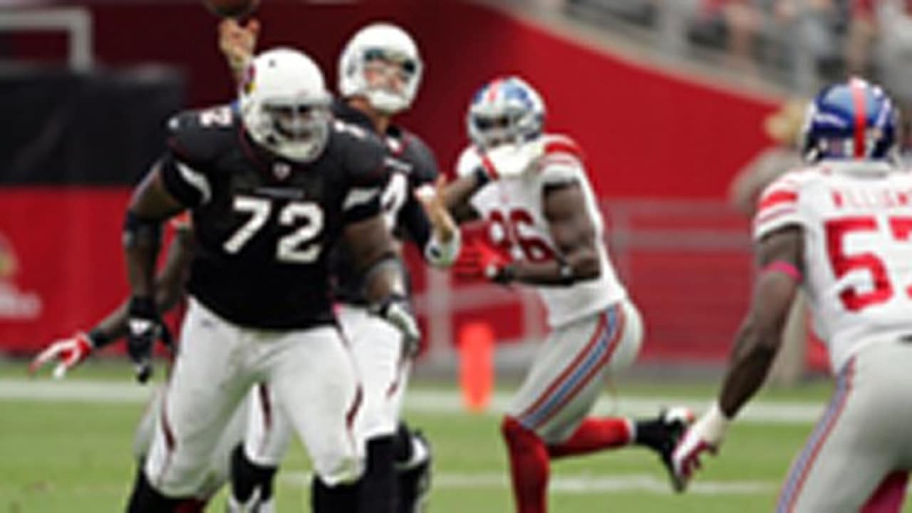 Arizona Cardinals' Brandon Keith, left, blocks Cleveland Browns