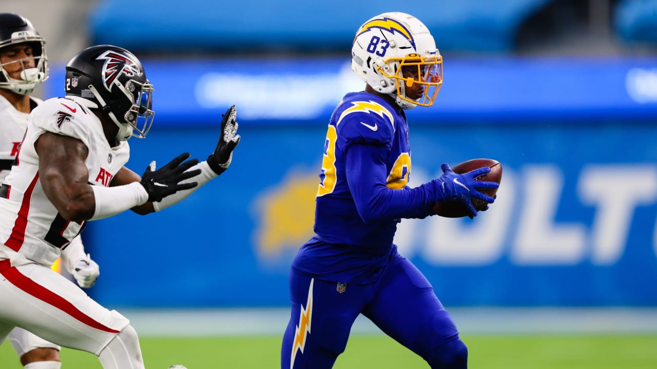 Los Angeles Chargers wide receiver Tyron Johnson (83) is defended