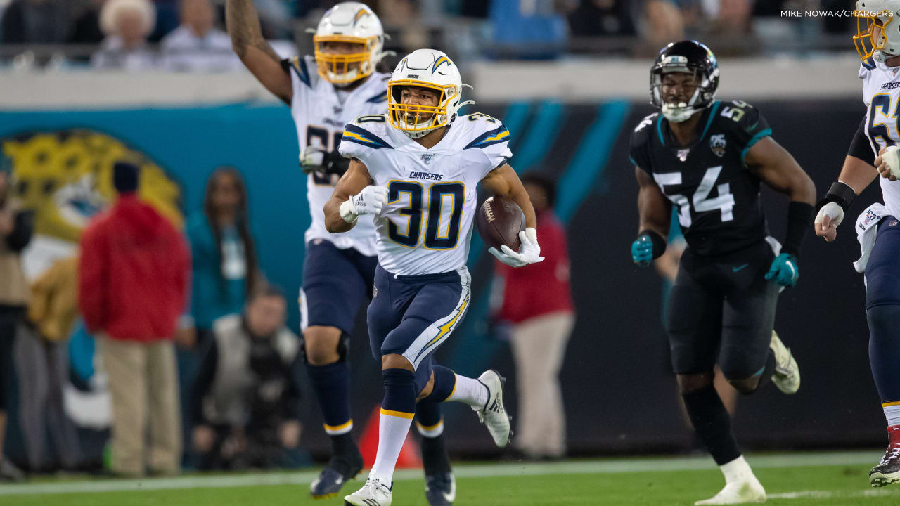 Los Angeles Chargers running back Joshua Kelley (25) carries against the  Los Angeles Rams during the first half of a preseason NFL football game  Saturday, Aug. 12, 2023, in Inglewood, Calif. (AP