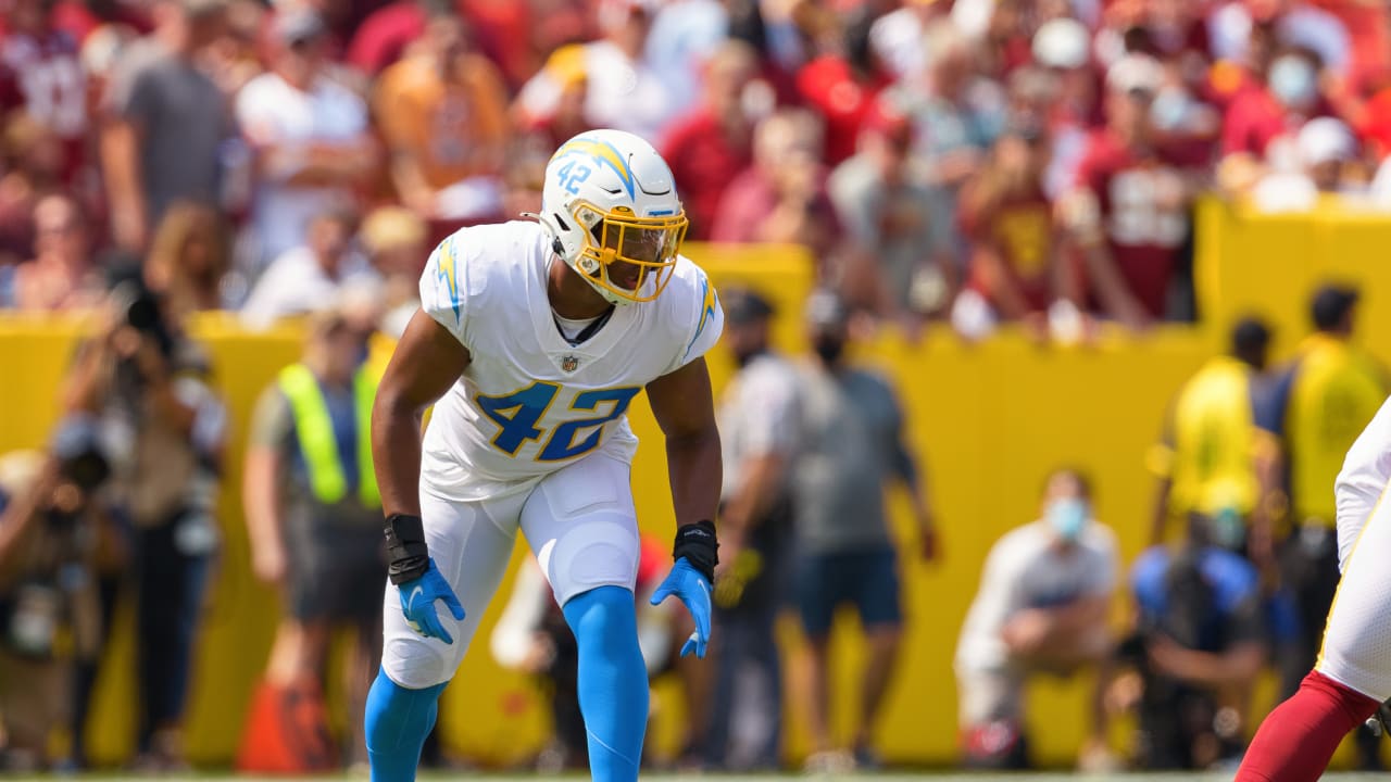 September 12, 2021: Los Angeles Chargers defensive end Joey Bosa (97)  stretches before the NFL regular season game between the Los Angeles  Chargers and the Washington Football Team at FedEx Field in