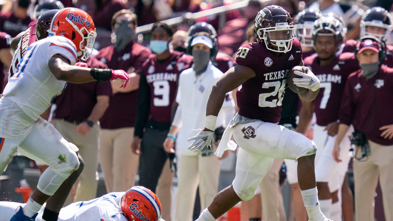 Texas A&M running back Isaiah Spiller runs a drill during the NFL