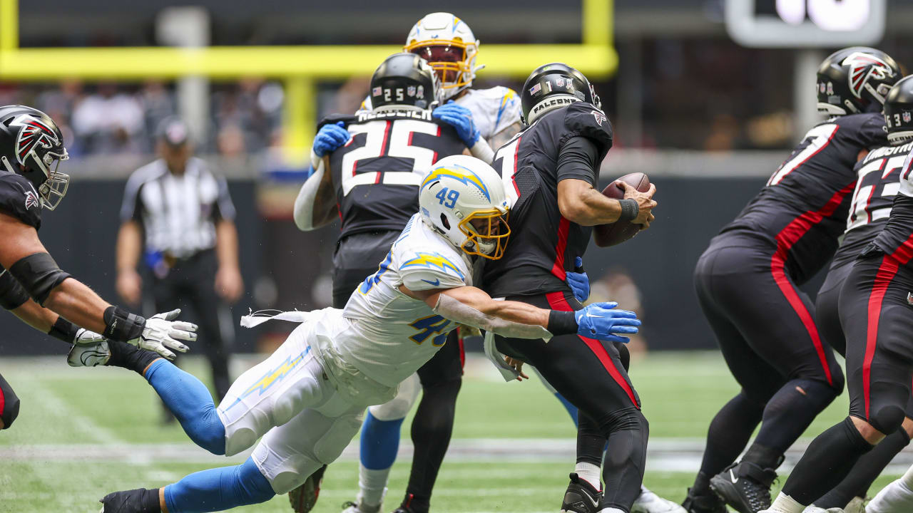 Atlanta Falcons safety Dean Marlowe (21) warms up before a