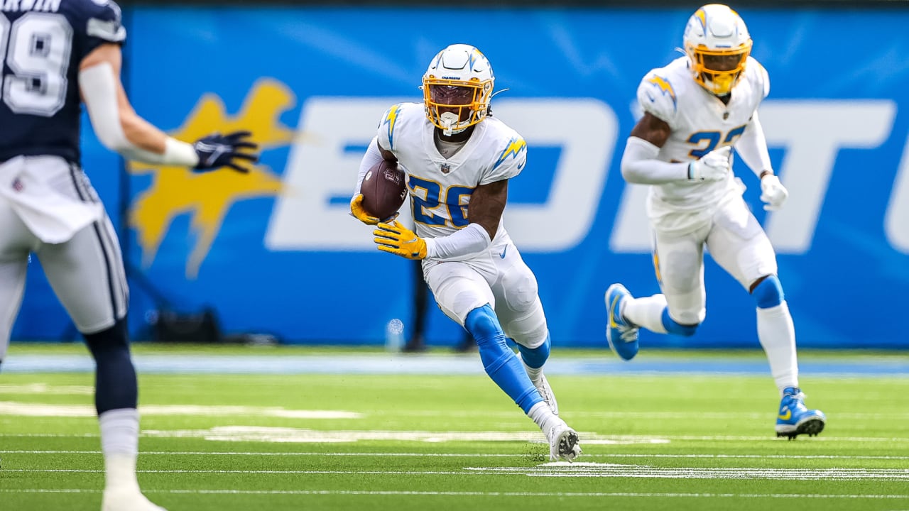 Running back (20) Tony Pollard of the Dallas Cowboys runs and scores a  touchdown against the Los Angeles Chargers in an NFL football game, Sunday,  Sept. 19, 2021, in Inglewood, Calif. The