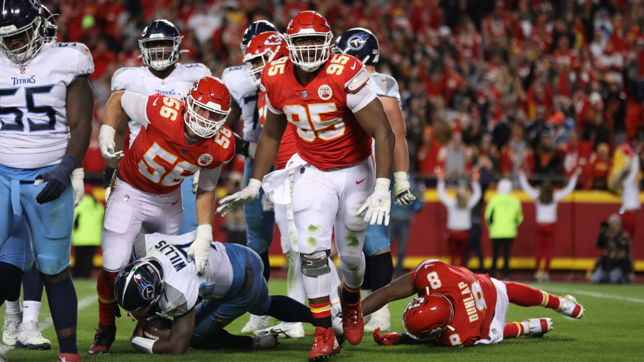 Kansas City Chiefs defensive end Carlos Dunlap (8) rushes on