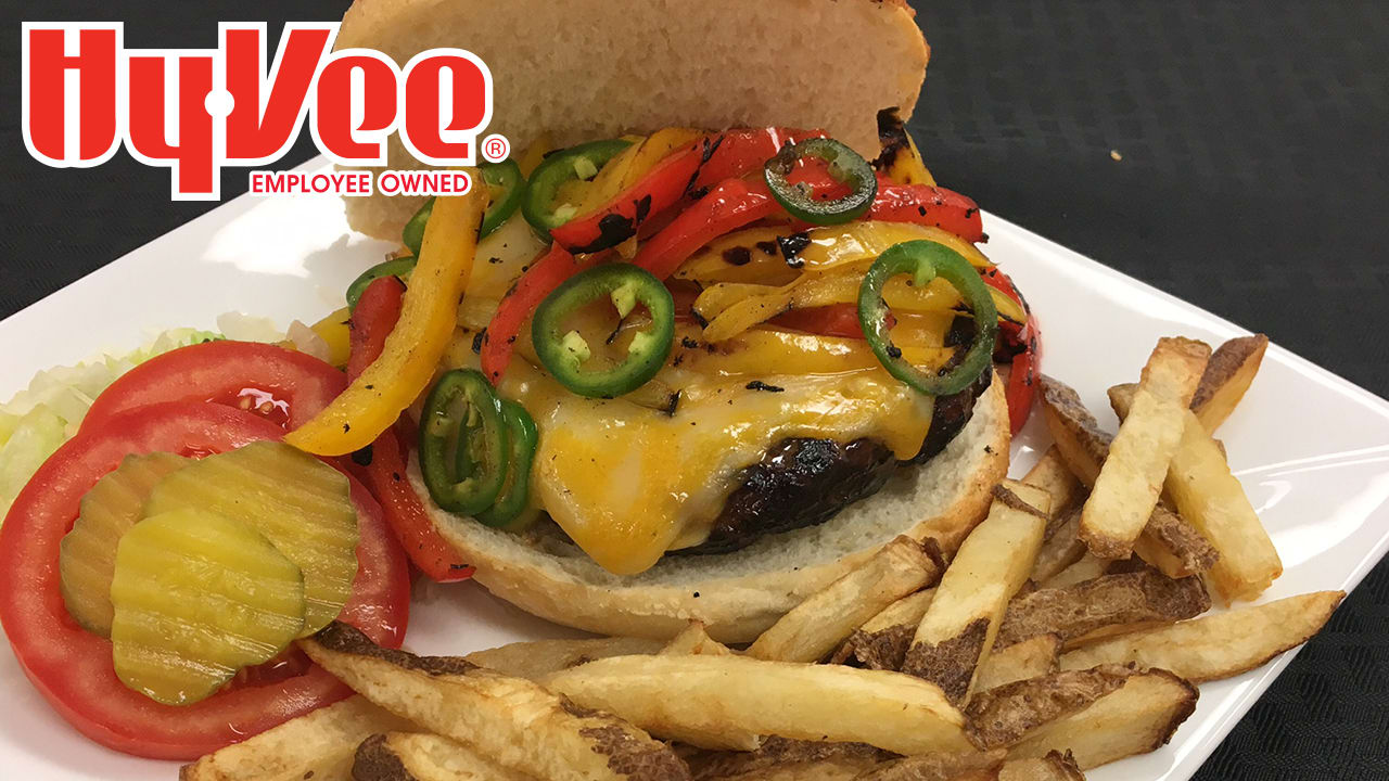 Chiefs Eats Grilled Jalapeno Burger with Sautéed Peppers and Fries