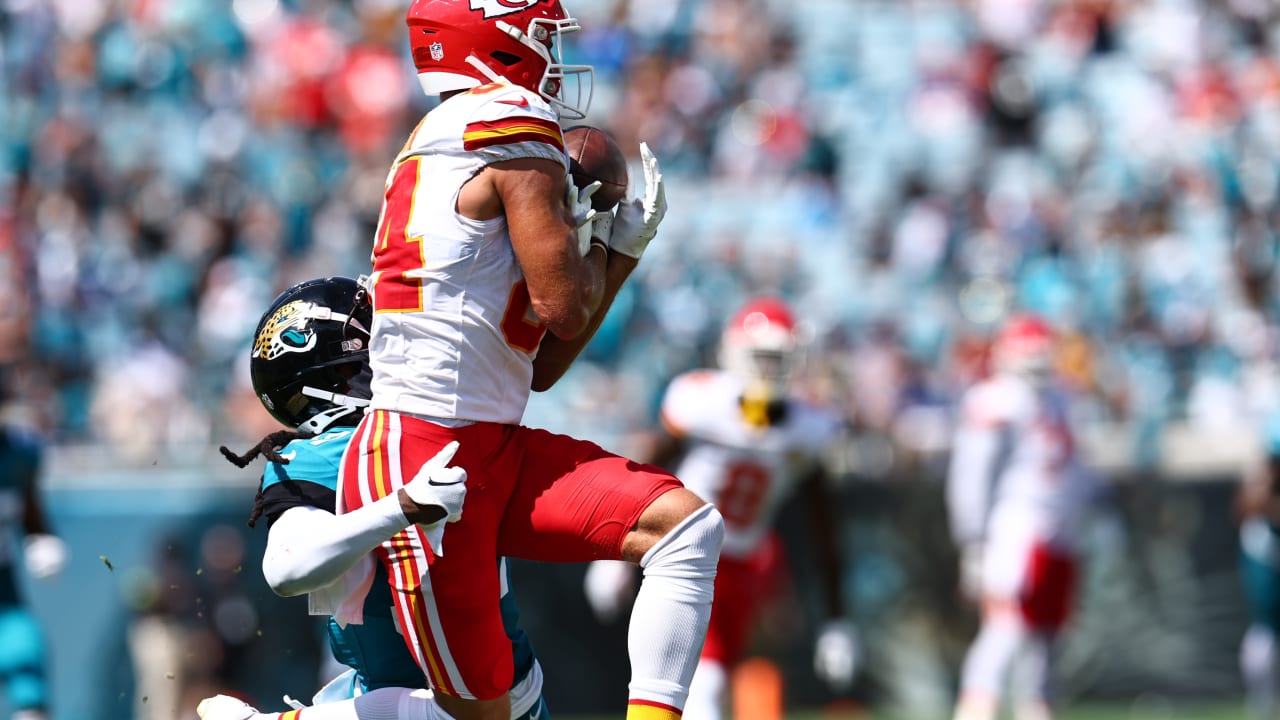 Kansas City Chiefs wide receiver Justyn Ross shoves defensive back away on  14-yard catch and run