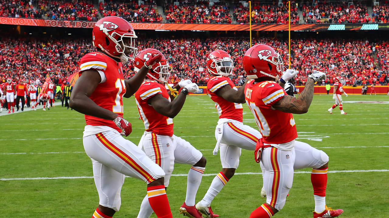 Kansas City Chiefs quarterback Patrick Mahomes (15) celebrates with tight  end Travis Kelce (87) after throwing a 67-yard touchdown pass to Tyreek Hill  during the first quarter of an NFL football game