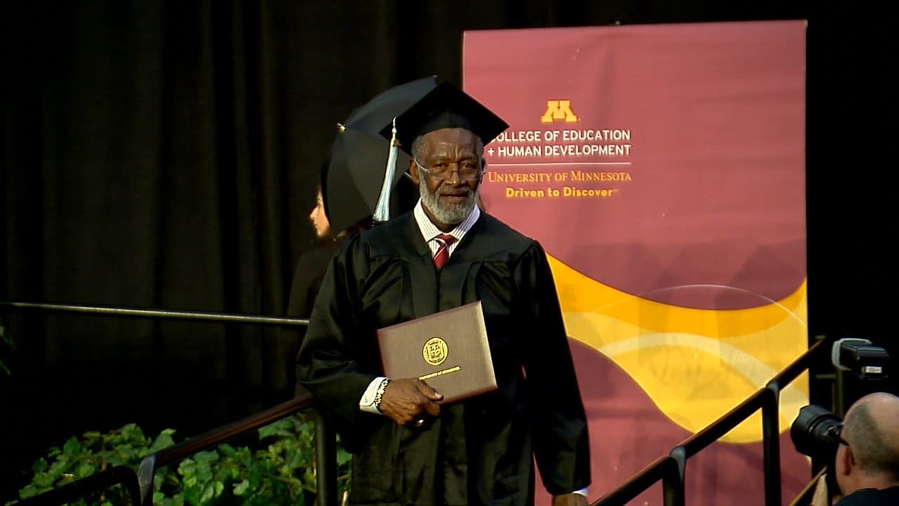 Bobby Bell Receives His Diploma