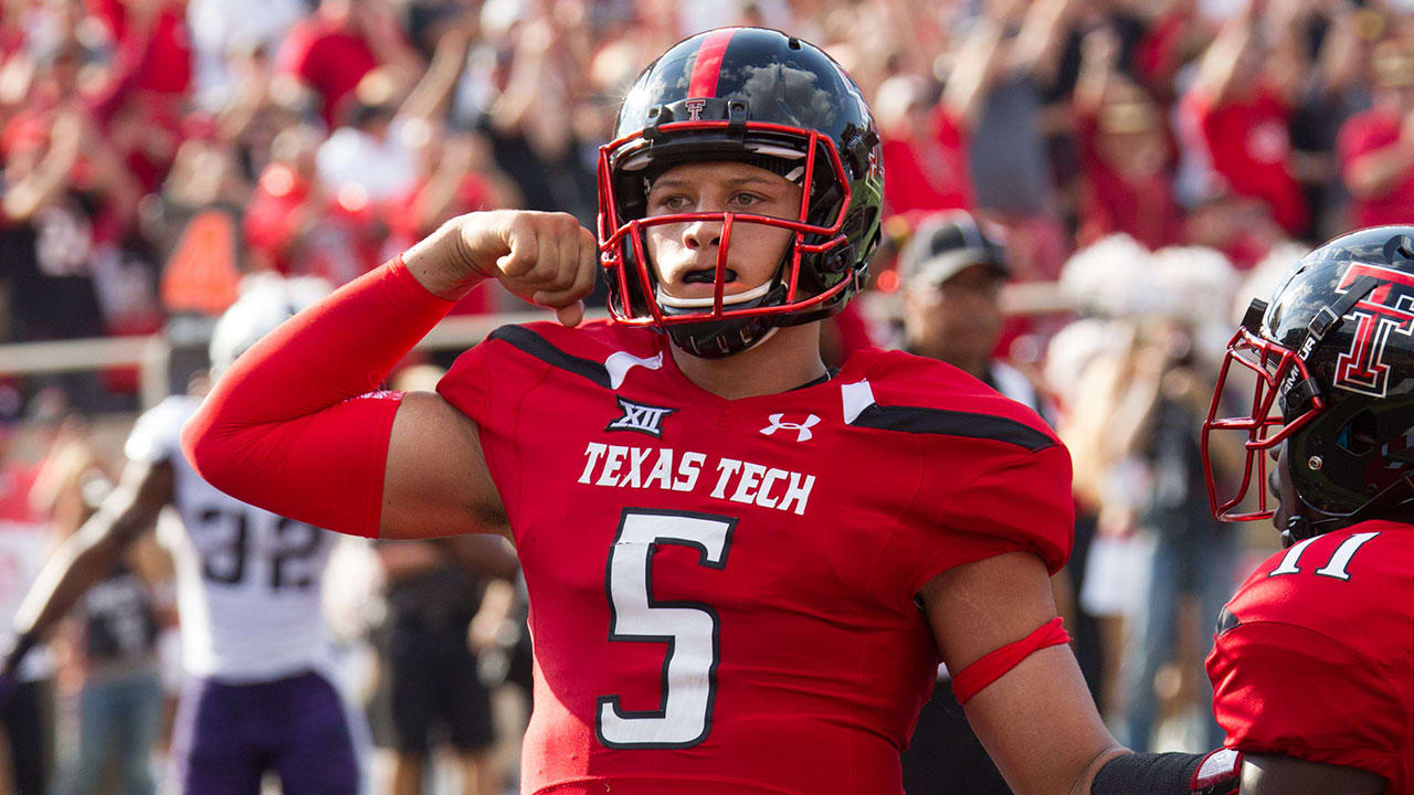 Patrick Mahomes Texas Tech Red Raiders Unsigned Black Jersey Throwing Close Up Photograph