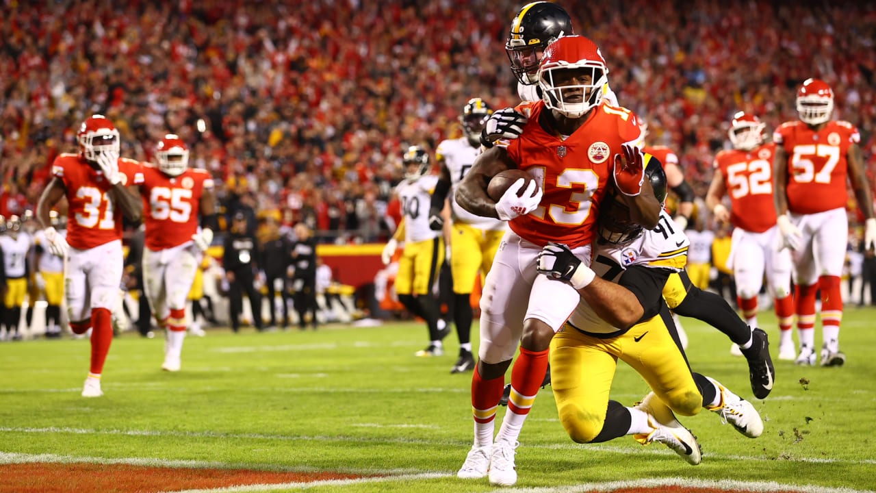 Kansas City Chiefs wide receiver Byron Pringle (13) runs down