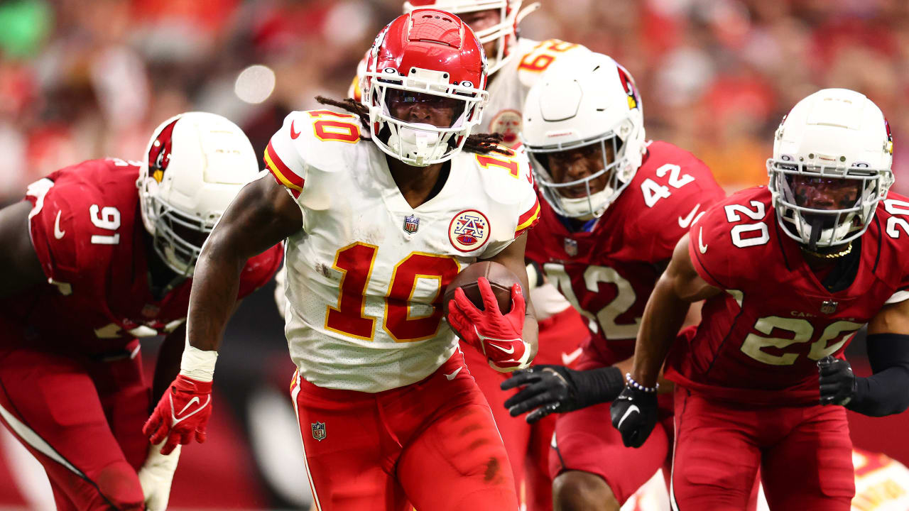 Kansas City Chiefs running back Isiah Pacheco celebrates with fans