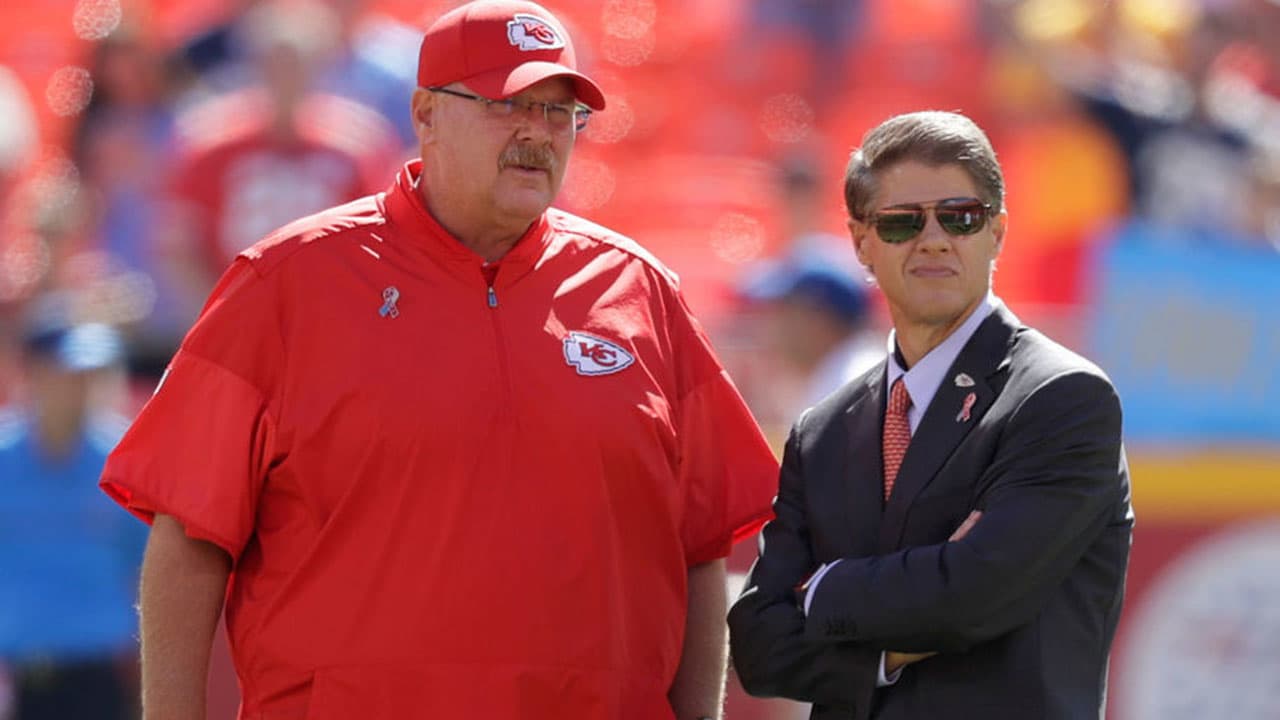 Kansas City Chiefs head coach Andy Reid watches a game replay while holding  the challenge flag …