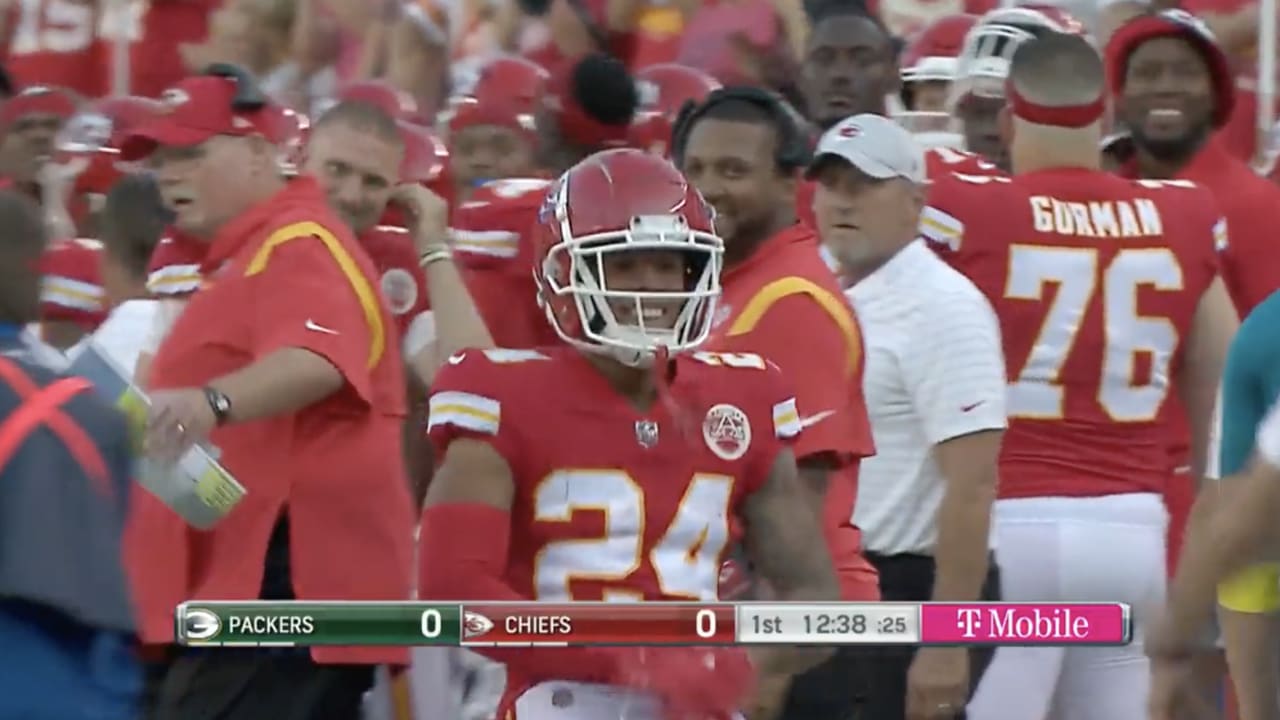 Kansas City Chiefs' Skyy Moore (24) flexes before their NFL football game  against the Arizona Cardinals