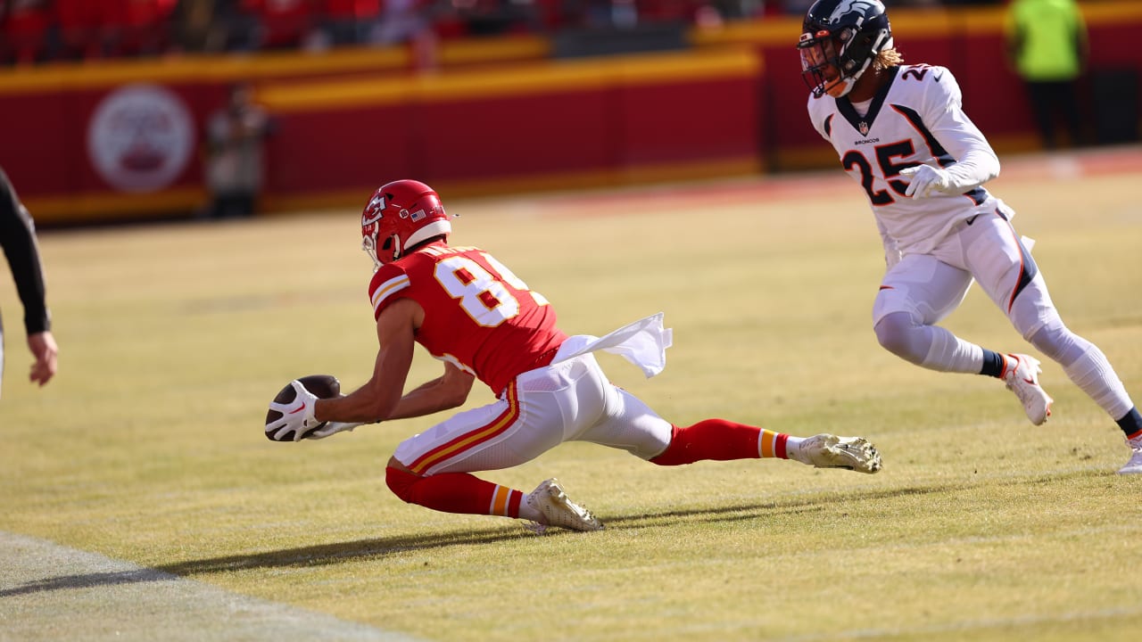 Kansas City Chiefs wide receiver Justin Watson (84) celebrates his  touchdown catch with teammate Jerick McKinnon (