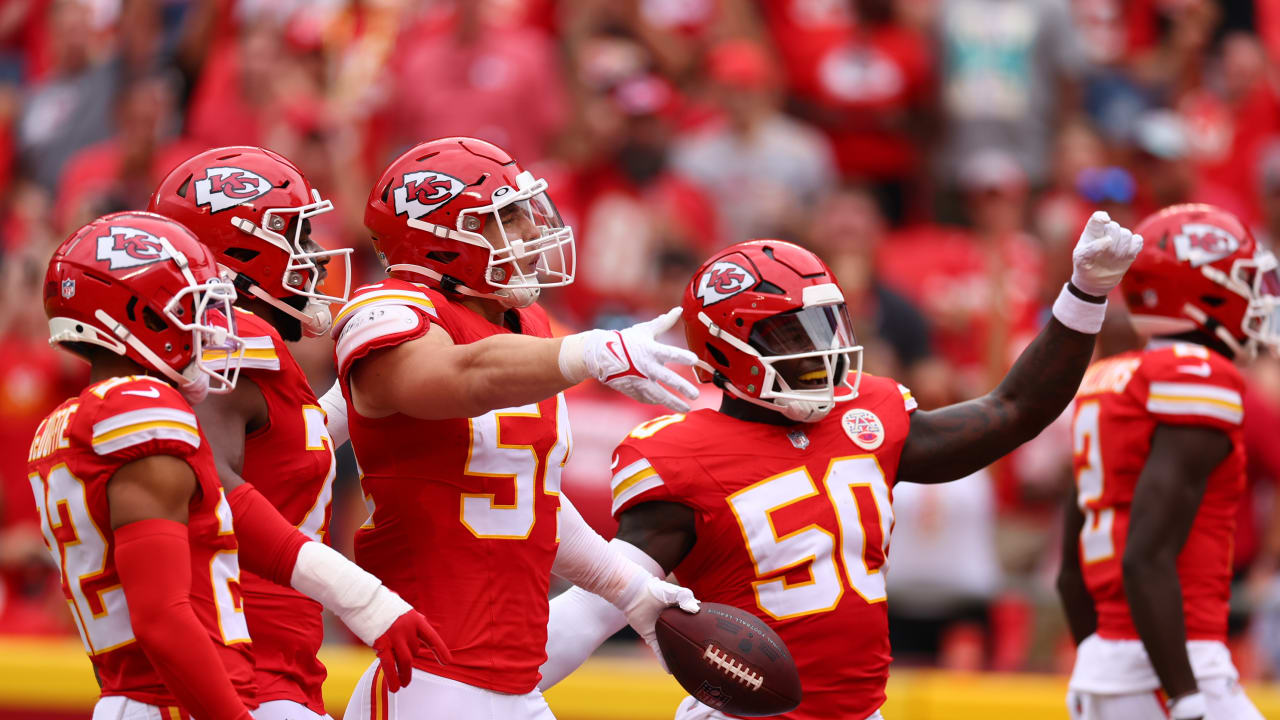 Kansas City Chiefs wide receiver Justyn Ross shoves defensive back away on  14-yard catch and run