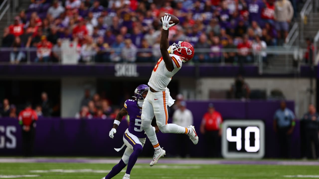 Kansas City Chiefs wide receiver Justyn Ross shoves defensive back away on  14-yard catch and run