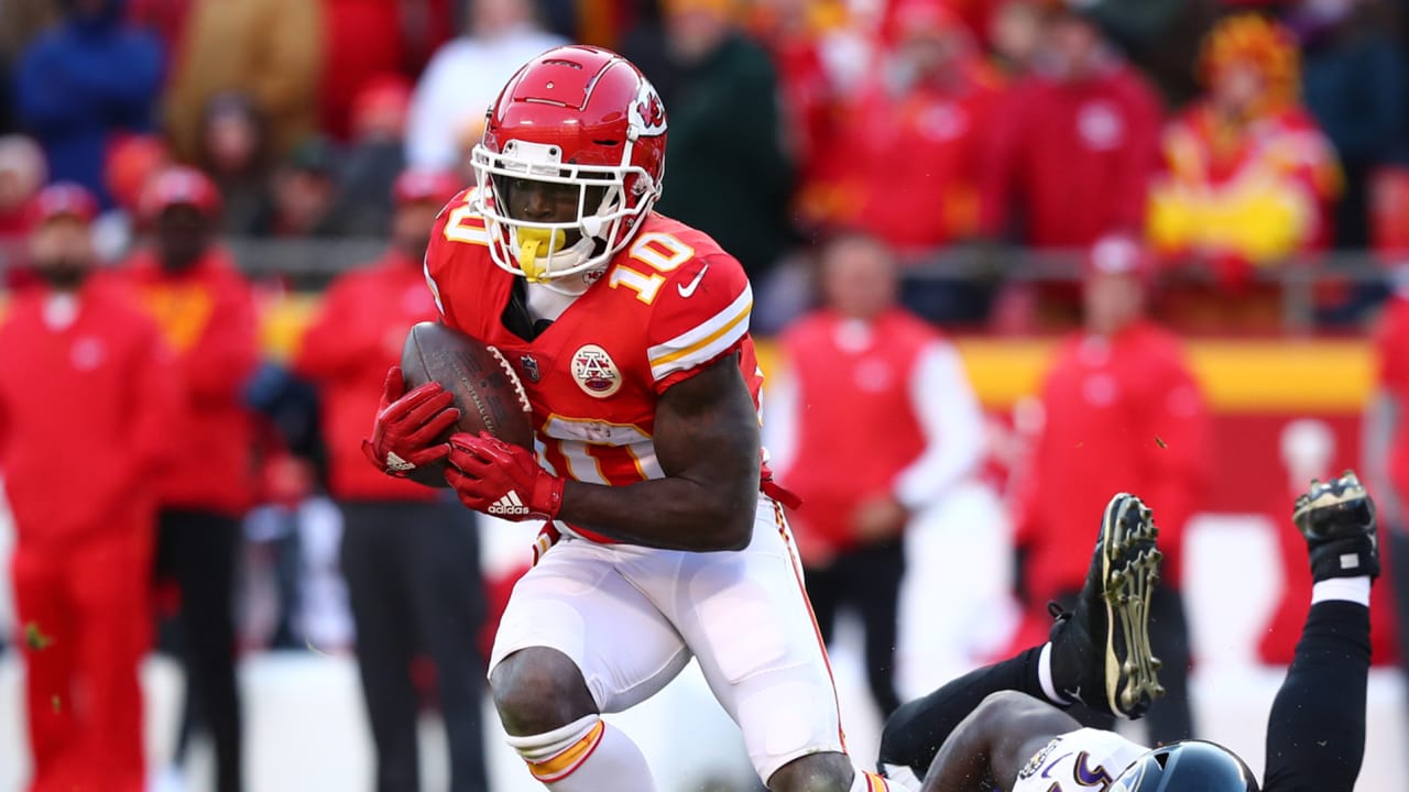 Kansas City Chiefs quarterback Patrick Mahomes and wide receiver Tyreek Hill  walk off the field together after Hill scored on a pass from Mahomes in the  fourth quarter against the Carolina Panthers