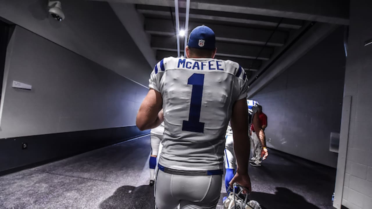 Indianapolis Colts kicker Adam Vinatieri (4) kicks a 43-yard field goal as  punter Pat McAfee (