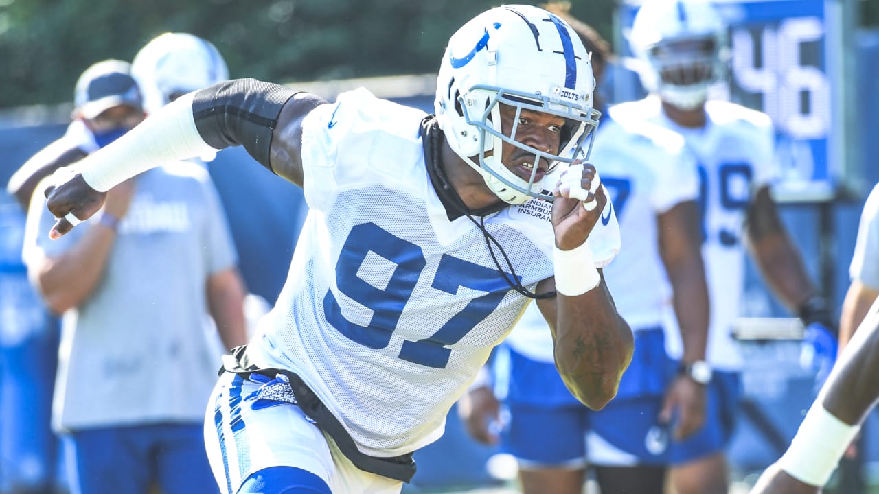 Indianapolis Colts defensive end Al-Quadin Muhammad (97) runs to