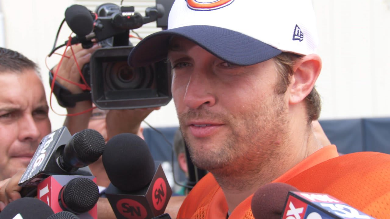 Indianapolis Colts quarterback Andrew Luck (12) greets Chicago Bears  quarterback Jay Cutler following an NFL preseason