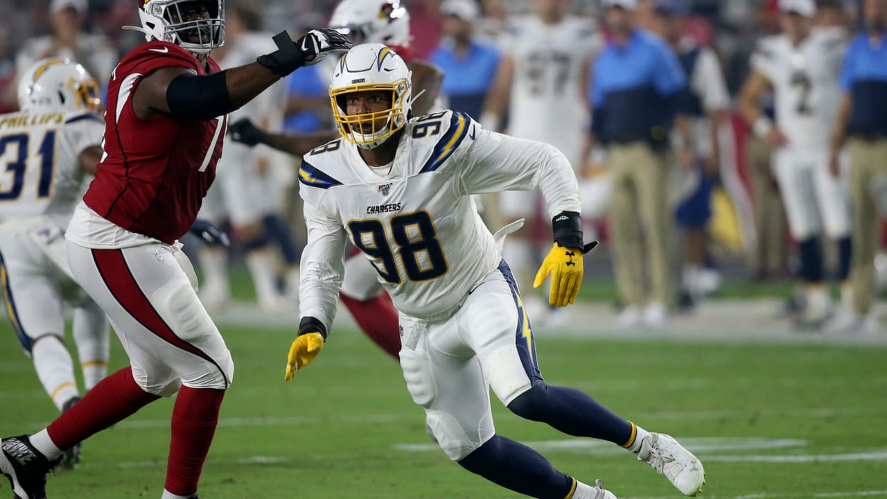 Las Vegas Raiders defensive end Isaac Rochell (96) walks off the