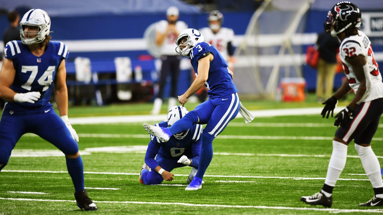 Indianapolis Colts kicker Rodrigo Blankenship (3) watches a video replay  during an NFL football …