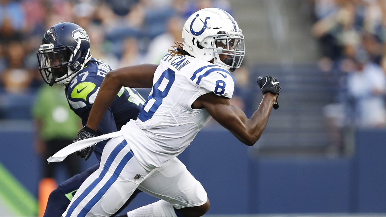 Tre Flowers of the Seattle Seahawks leans his head on the goal