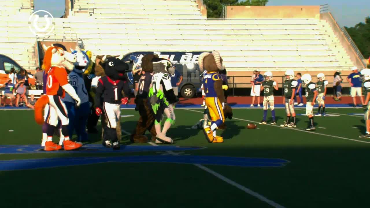 Mascots vs. pee-wees at Carmel High School