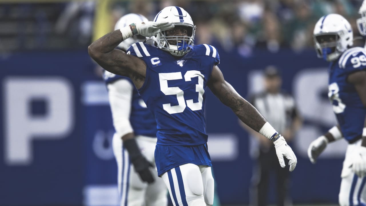 Indianapolis Colts outside linebacker Darius Leonard (53) pushes away New  England Patriots wide receiver Jakobi Meyers after intercepting a pass  during the first half of an NFL football game Saturday, Dec. 18