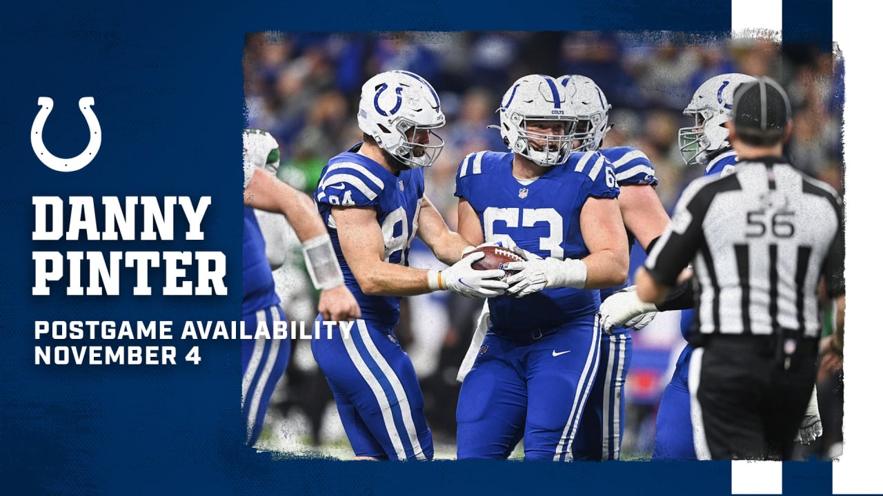 Indianapolis Colts guard Danny Pinter (63) points to the defense before the  snap during an NFL football game against the New England Patriots,  Saturday, Dec. 18, 2021, in Indianapolis. (AP Photo/Zach Bolinger