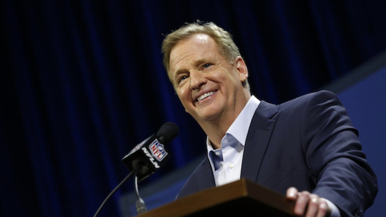 NFL Commissioner Roger Goodell, second from right, is joined by