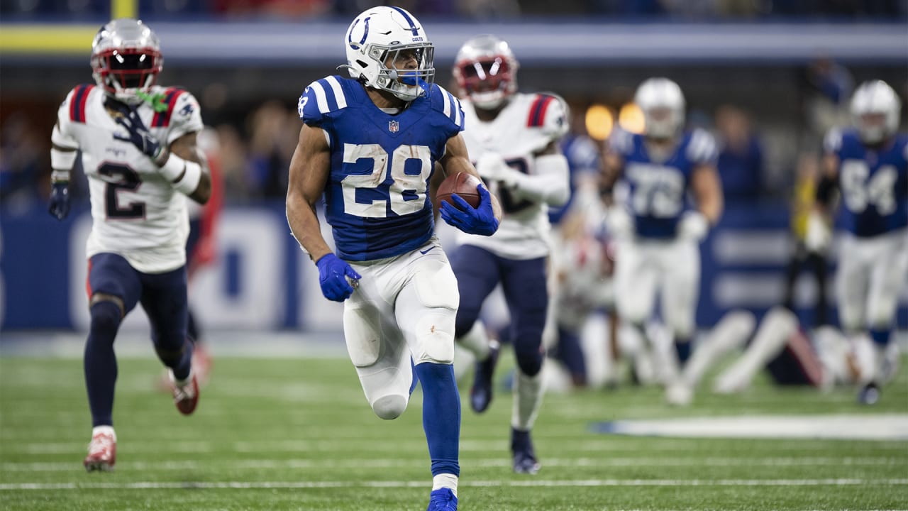 February 5, 2022: Indianapolis Colts defensive line DeForest Buckner (99)  signed a souvenir football and is throwing it into the crowd during the AFC Pro  Bowl Practice at Las Vegas Ballpark in