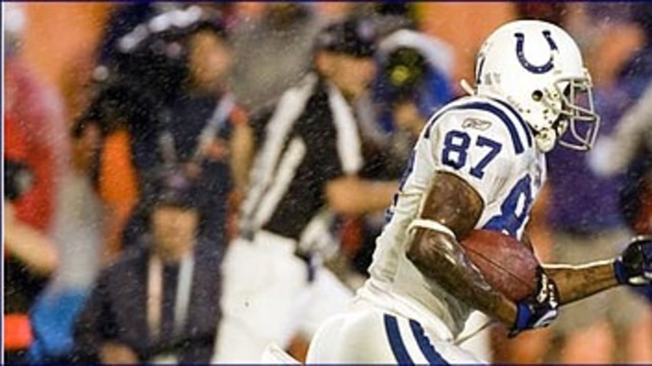 Cedric Benson of the Chicago Bears celebrates his touchdown with Rex