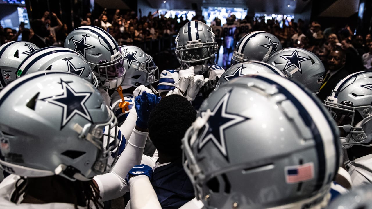 Dallas Cowboys offensive tackle Isaac Alarcon displays the flags