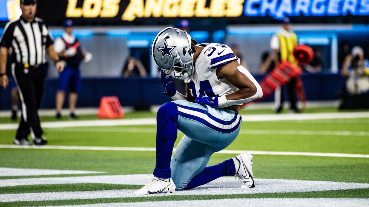 Dallas Cowboys running back Malik Davis (34) jogs to the next drill during  the NFL football team's rookie minicamp in Frisco, Texas, Friday, May 13,  2022. (AP Photo/Michael Ainsworth Stock Photo - Alamy