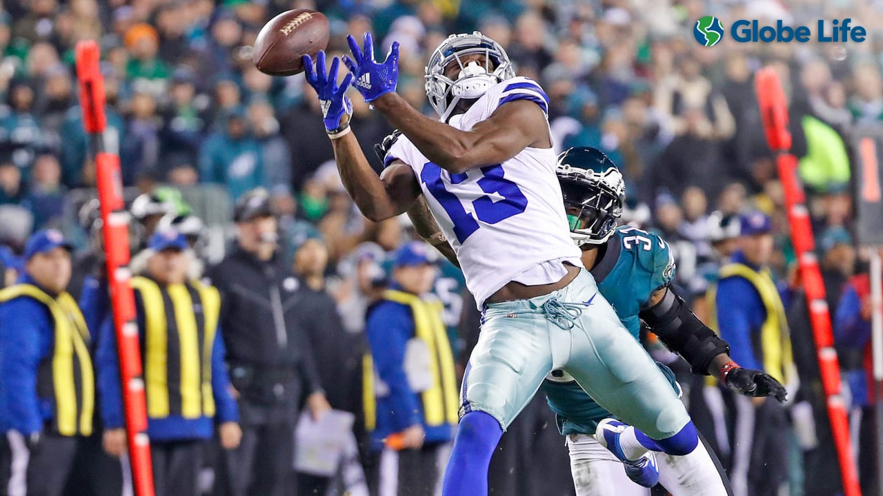 Arlington, Texas, USA. 14th Oct, 2018. Dallas Cowboys wide receiver Michael  Gallup (13) makes a catch with Jacksonville Jaguars cornerback A.J. Bouye  (21) trying to break it up during the first half