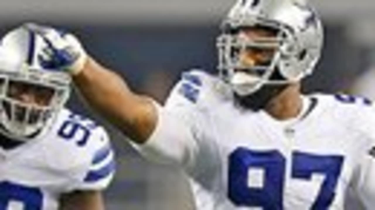 Dallas Cowboys linebacker DeMarcus Ware (94) and defensive end Jason  Hatcher (97) celebrate Ware's second sack of the first half against the New  York Giants in the NFL season opener at MetLife