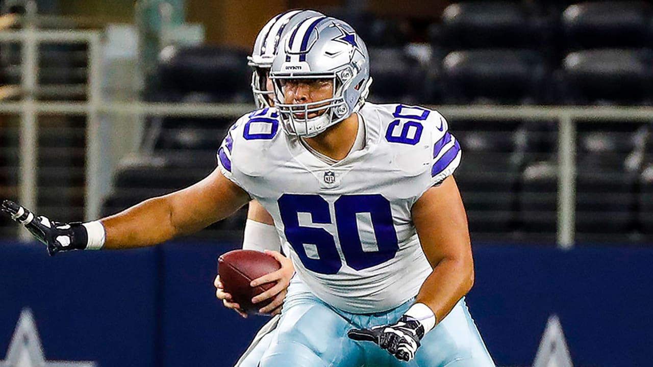 Dallas Cowboys offensive tackle Isaac Alarcon watches from the