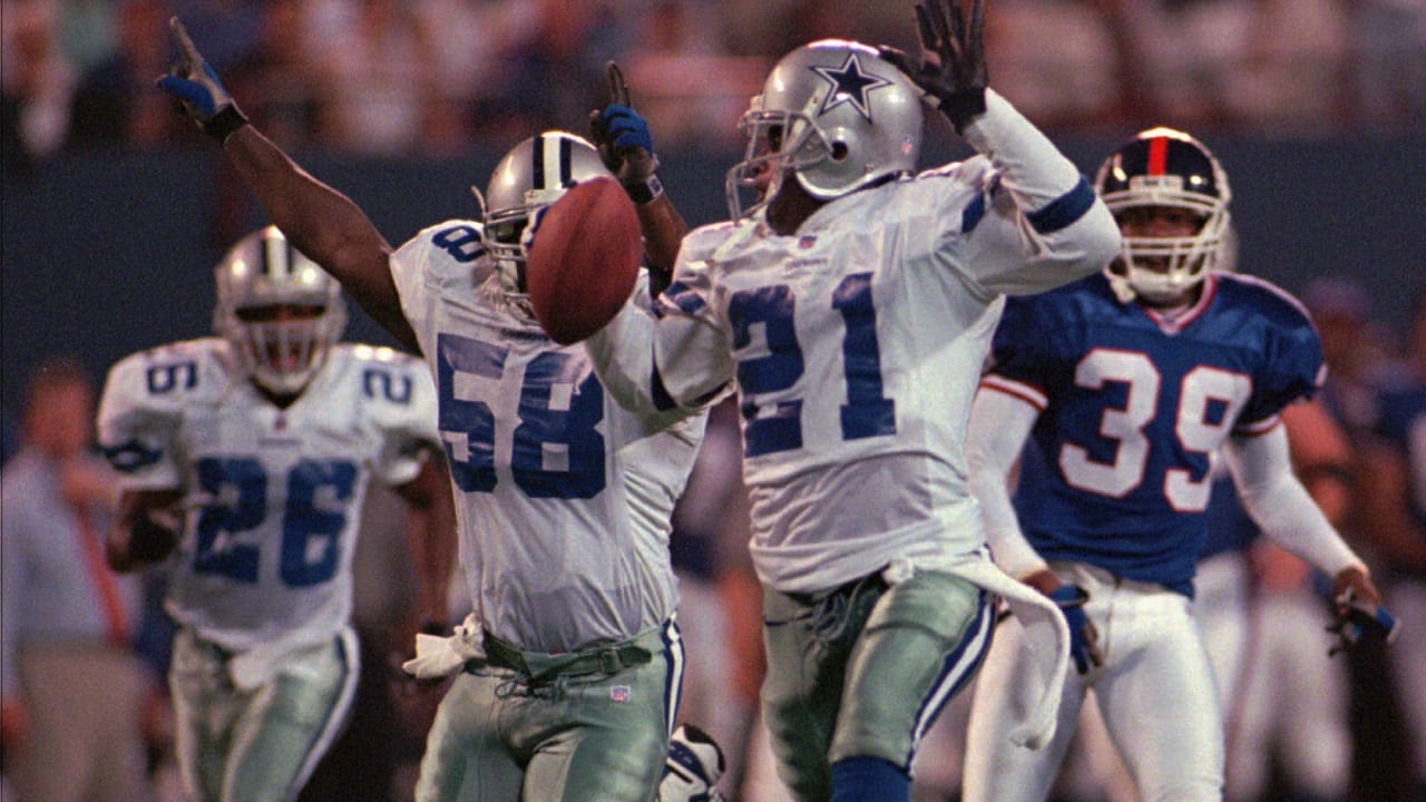 Dallas Cowboys running back Julius Jones gets hit by New York Giants  defender Curtis Deloatch in week 13 at Giants Stadium in East Rutherford,  New Jersey on December 4, 2005. The New