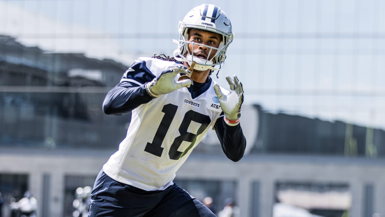 Dallas Cowboys wide receiver Jalen Tolbert (18) lines up against