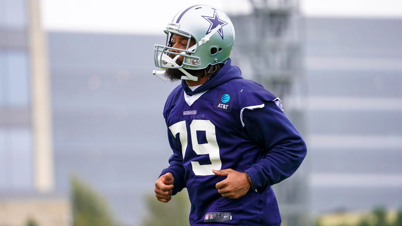 Dallas Cowboys defensive lineman Michael Bennett (79) walks onto the field  for an NFL football team practice in Frisco, Texas, Tuesday, Oct. 29, 2019.  The Cowboys acquired Bennett from the New England