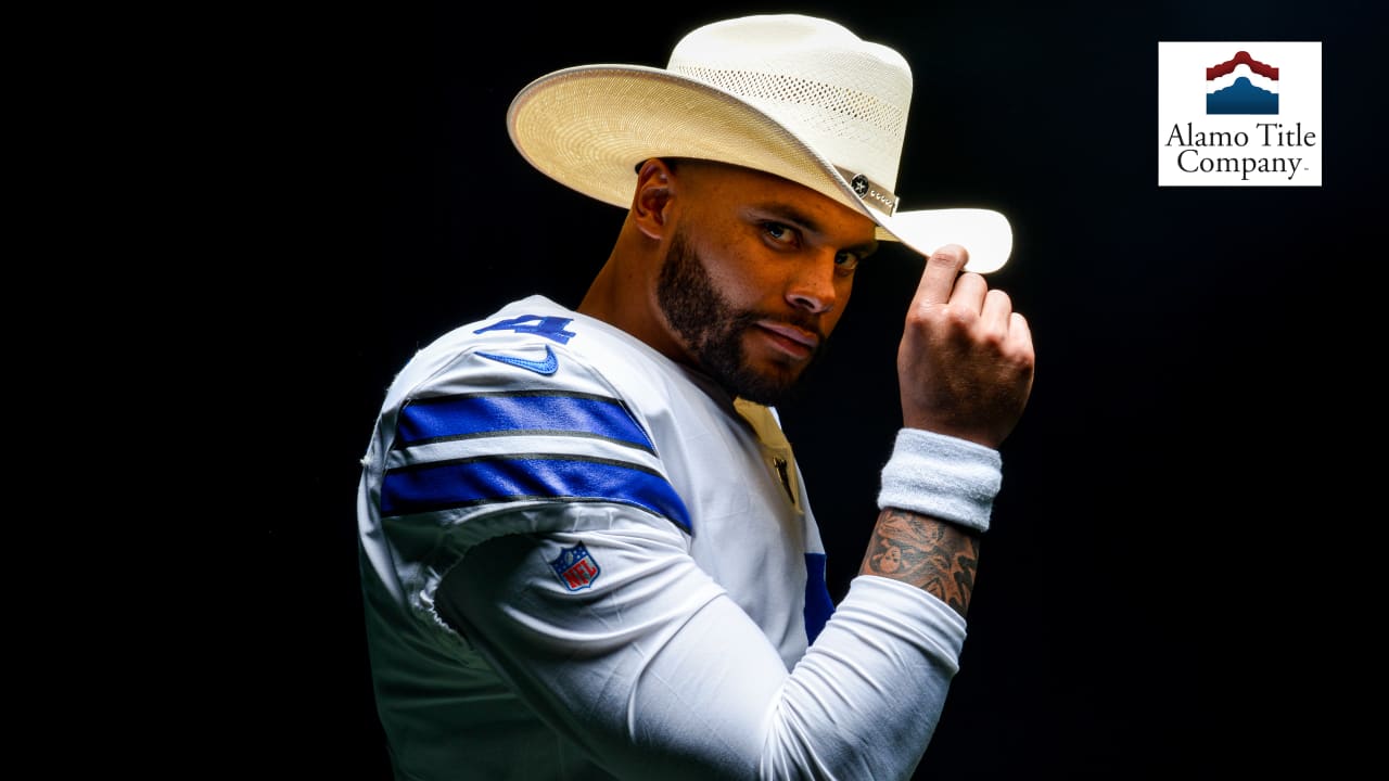 CowBuzz: Dak Tips His Cowboy Hat After Signing