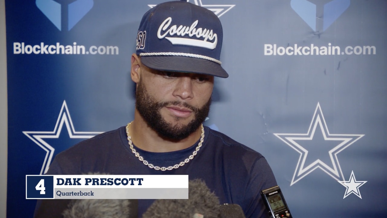 Dallas Cowboys quarterback Dak Prescott wears a Crucial Catch hat